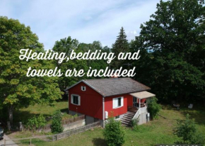 Vacation villa with fenced yard in Blomstermåla